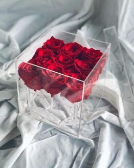 9 roses in a perspex box